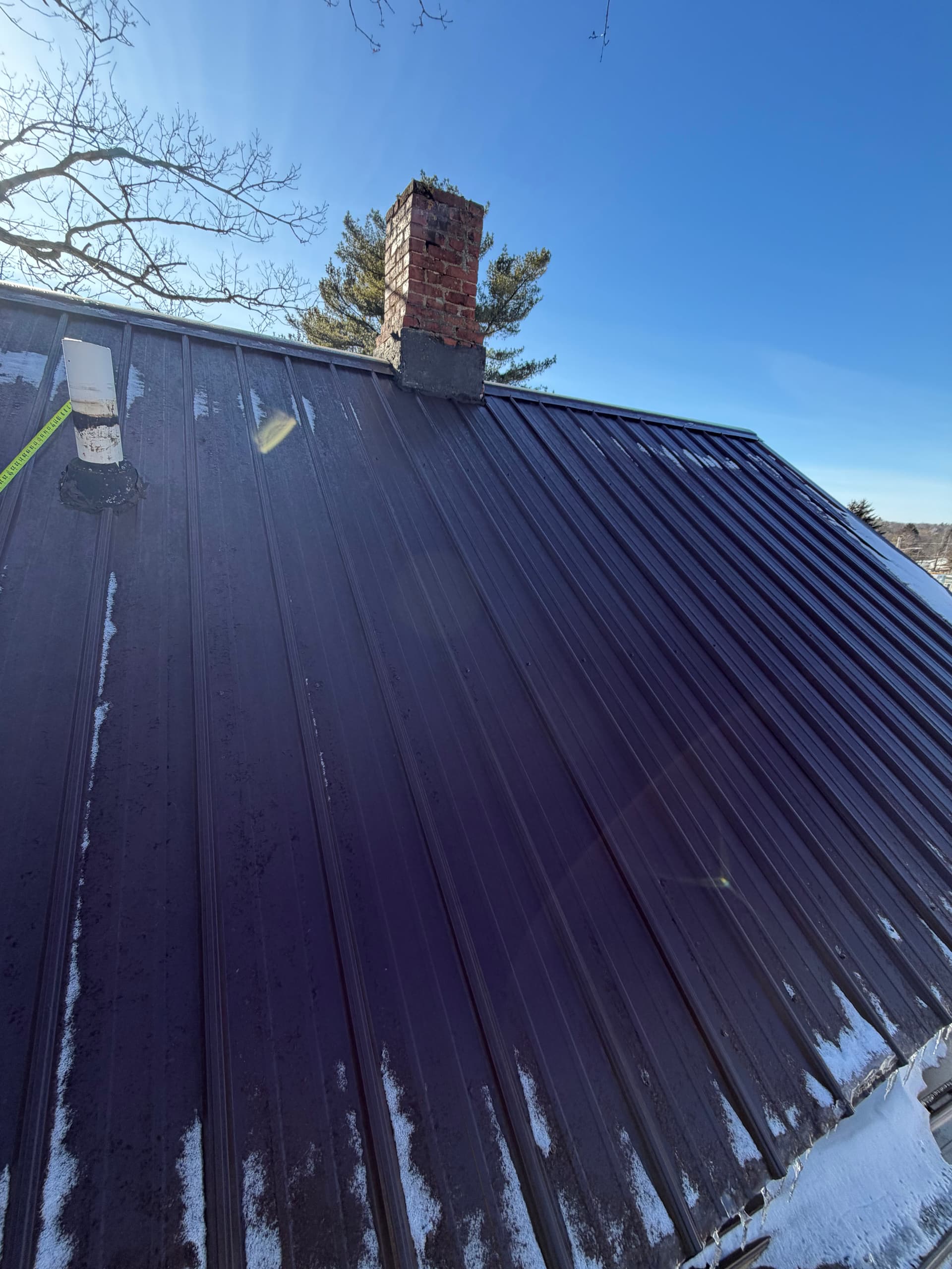 Chimney Removal Done Right on a Metal Roof image